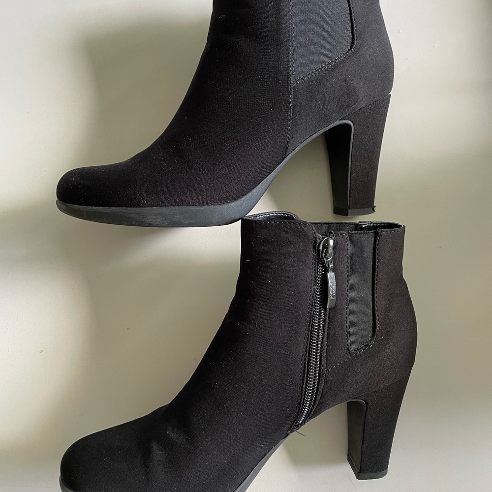 Black heeled booties. Size 8, but fit like a 7.5.